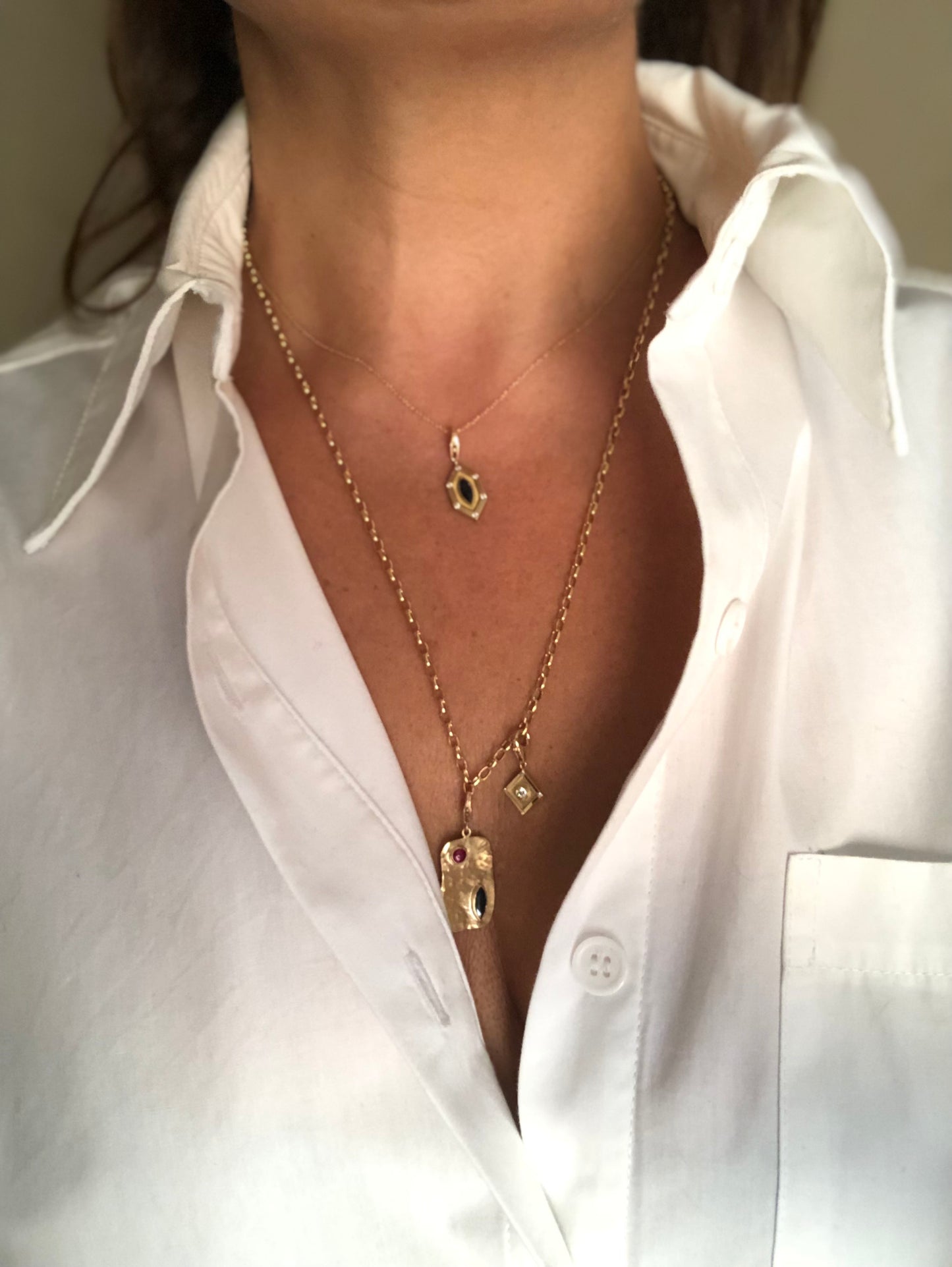 Adjustable chain with small rings in yellow gold