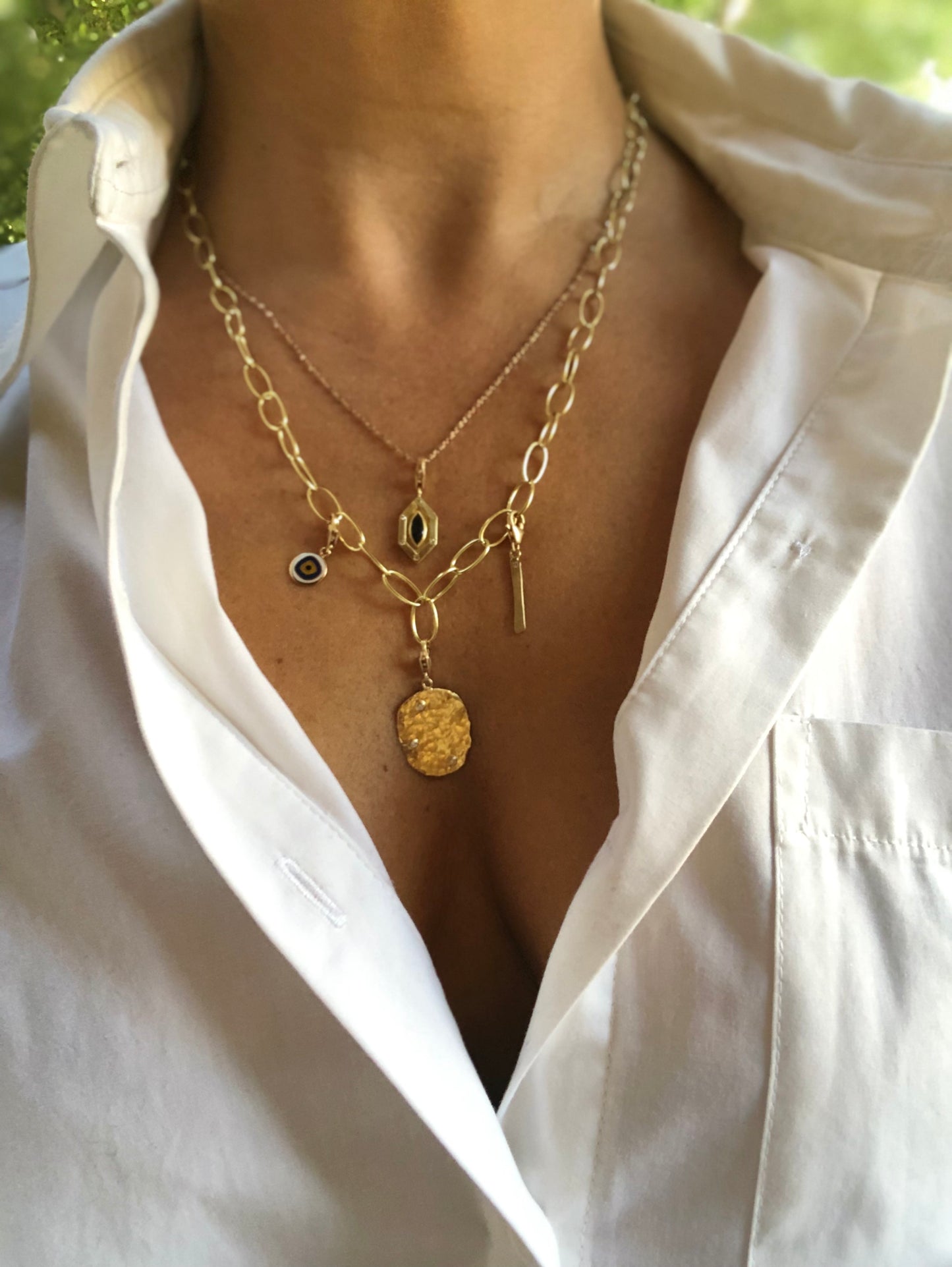 Adjustable chain with big rings in yellow gold