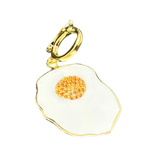 Sunny Side up charm in yellow gold and orange sapphire