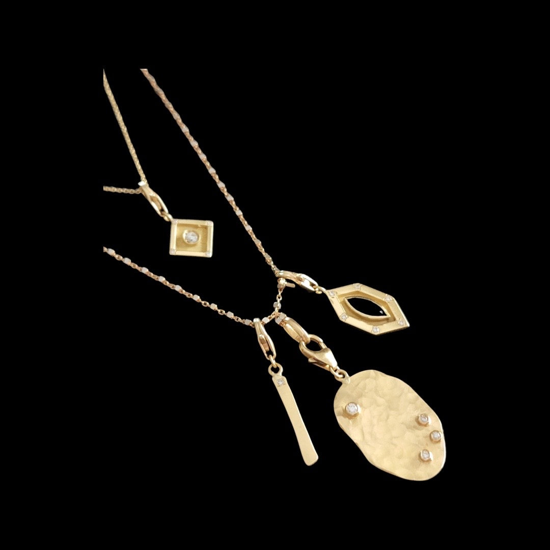 Art Deco charm with marquise blue sapphire and diamonds in pink gold
