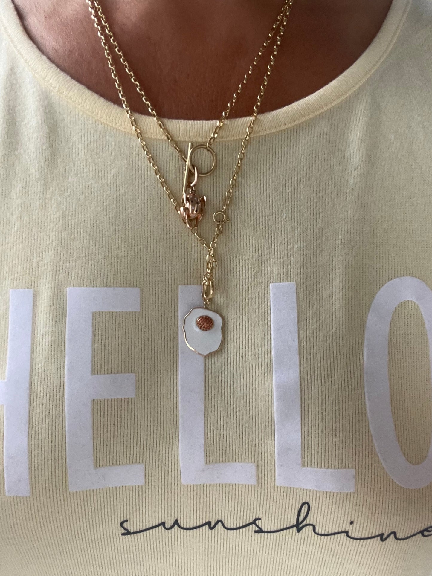 Sunny Side up charm in yellow gold and orange sapphire