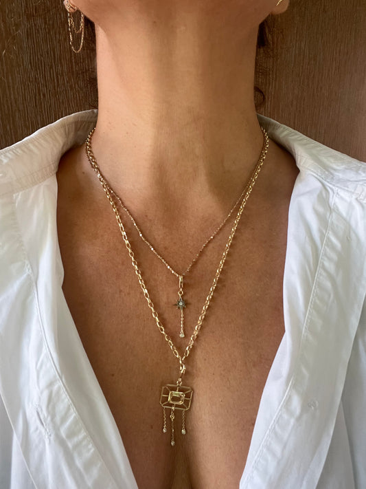 Net charm with yellow Royal Topaz and diamonds in yellow gold