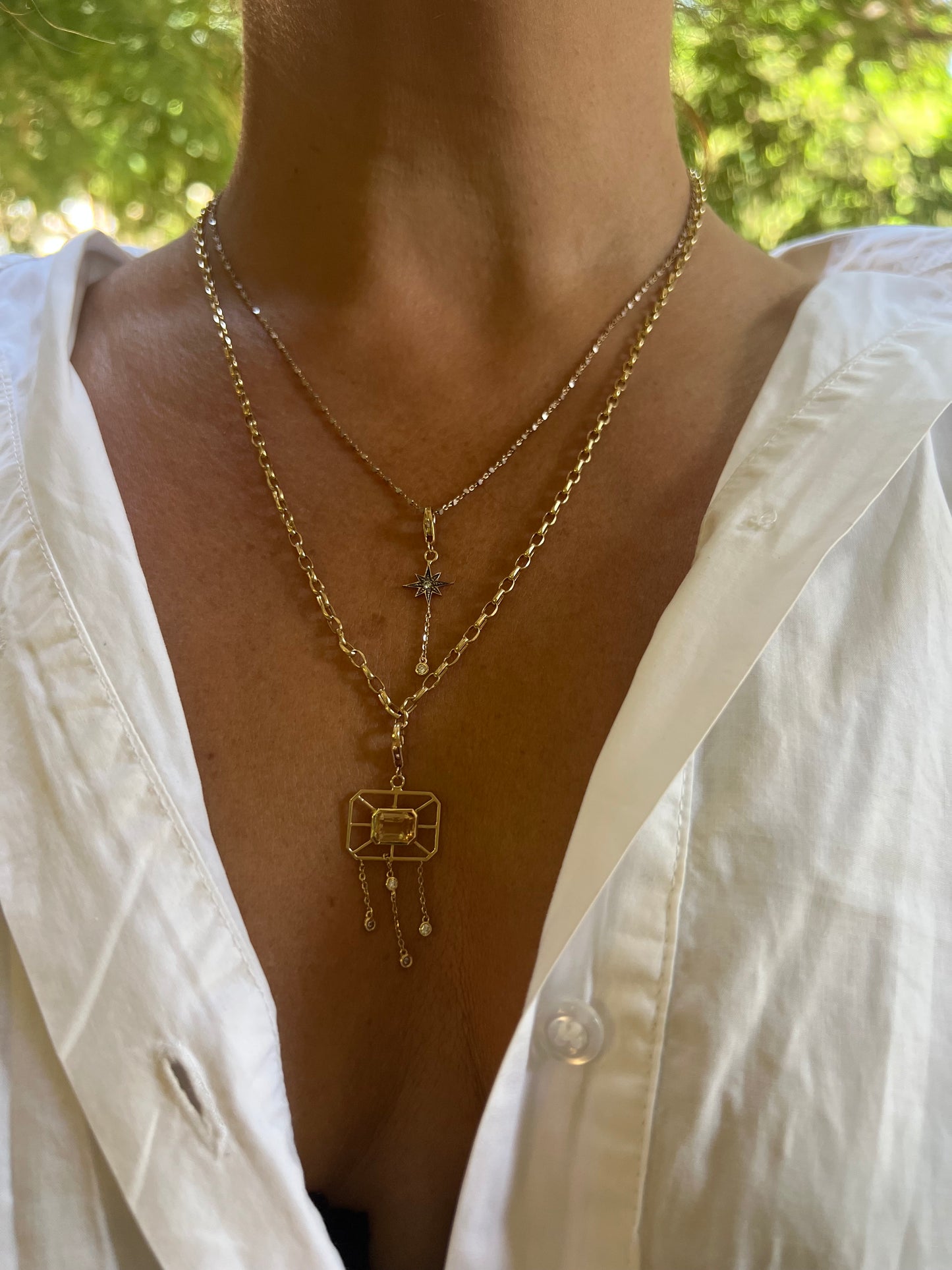 Net charm with yellow Royal Topaz and diamonds in yellow gold