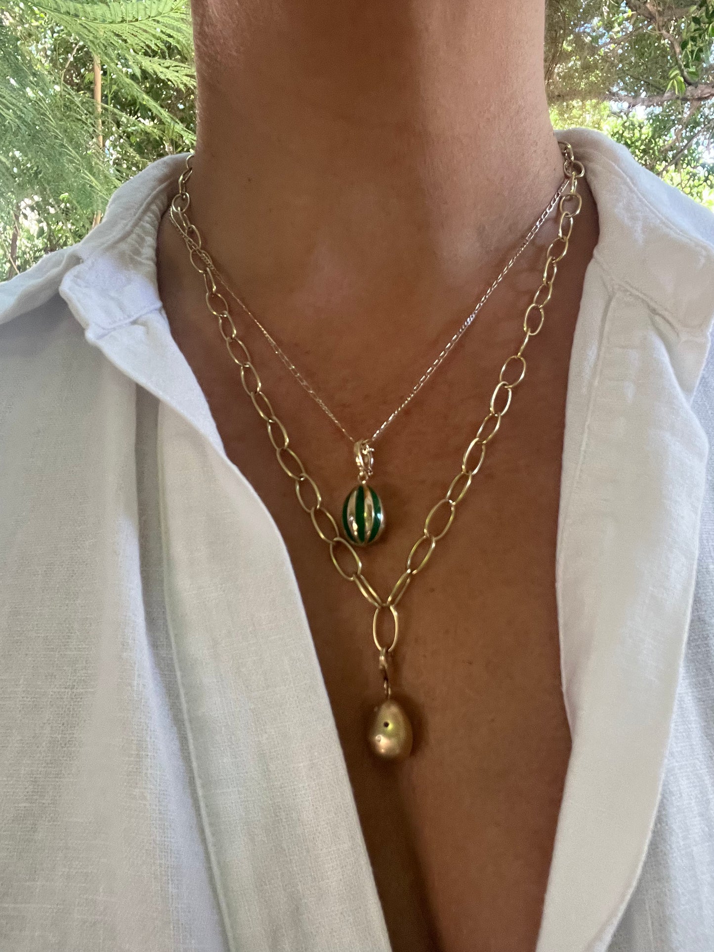 Emerald Green enamelled Lucky beginning egg charm with scattered diamonds