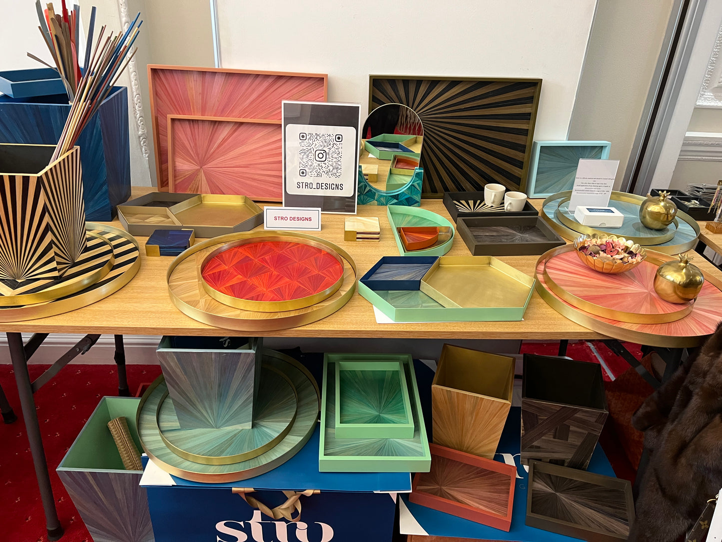 Semi matte finish coin charm with a blue sapphire in yellow gold