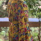Yellow envelop dress with ruffles