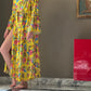 Yellow envelop dress with ruffles