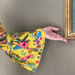 Yellow envelop dress with ruffles