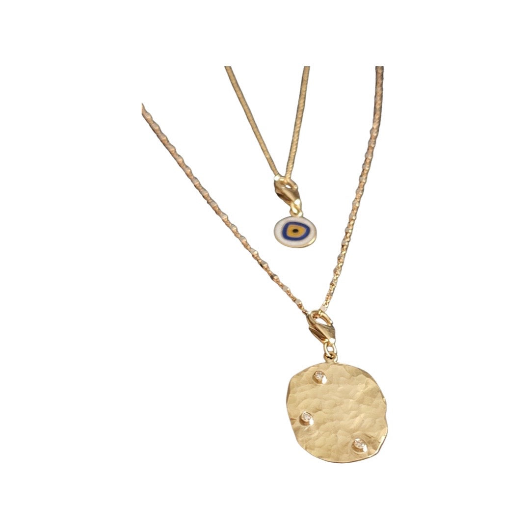 Hammered page charm with diamonds in yellow gold