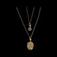 Hammered page charm with diamonds in yellow gold