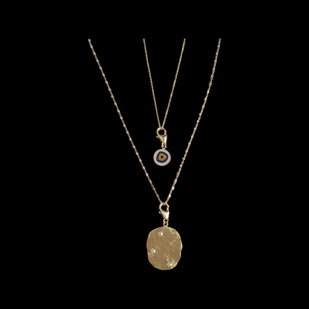 Hammered page charm with diamonds in yellow gold