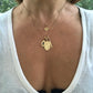 Organic shaped hand hammered large charm with diamonds in yellow gold