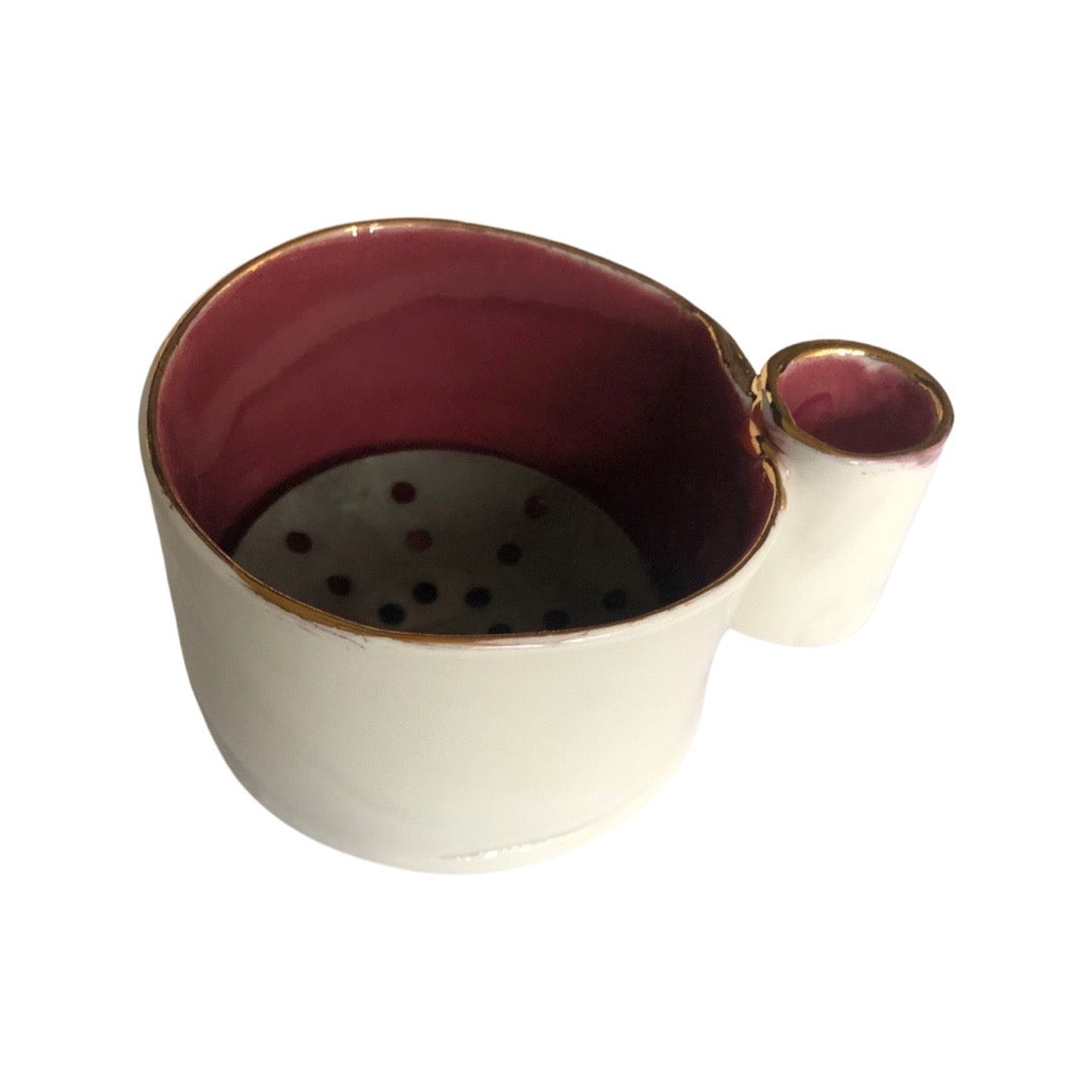 White outside ruby inside burner with Gold rim and small cylindrical handle