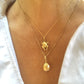 Lucky beginning egg charm with ruby and diamonds in yellow gold