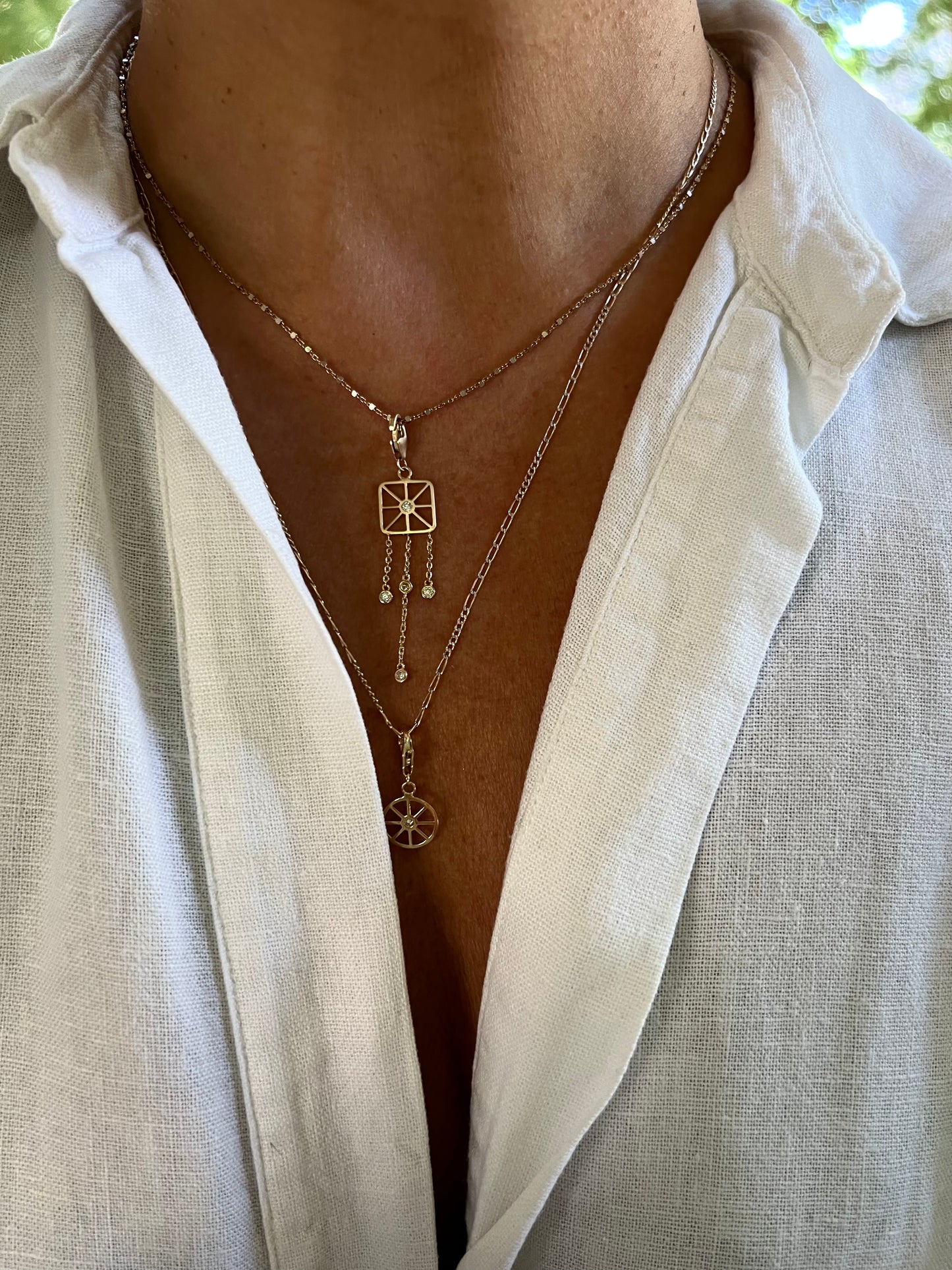 Net square charm with diamonds and chains