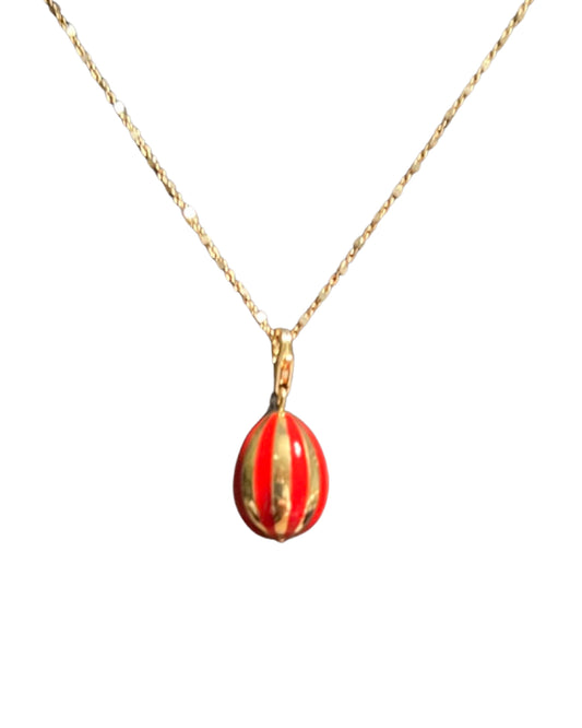 Enameled red and gold Lucky beginning egg charm, polished